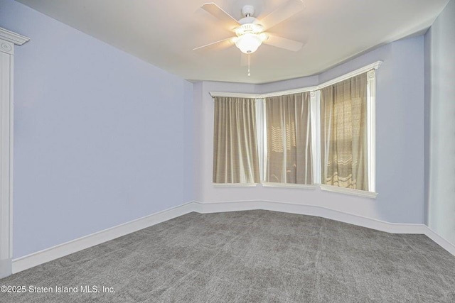 31 Seeley St, Brooklyn, NY 11218 - empty room with carpet floors, baseboards, and ceiling fan