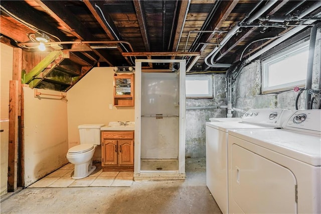 interior space with laundry area and washer and clothes dryer