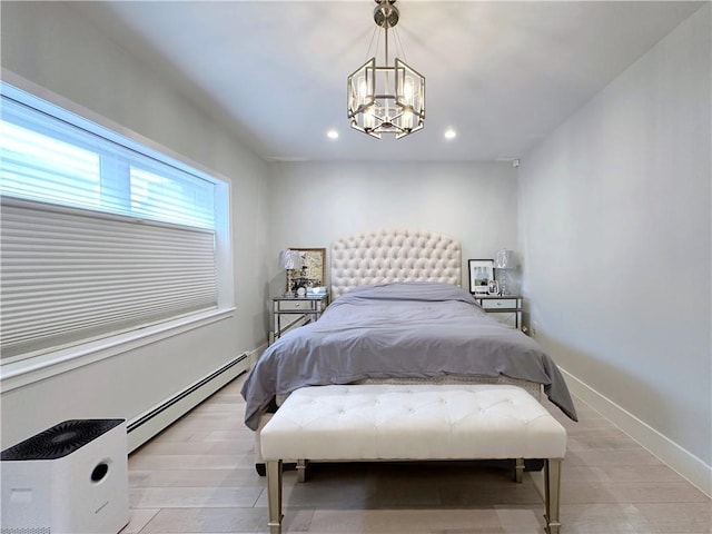 bedroom featuring baseboards, a baseboard radiator, wood finished floors, a notable chandelier, and recessed lighting