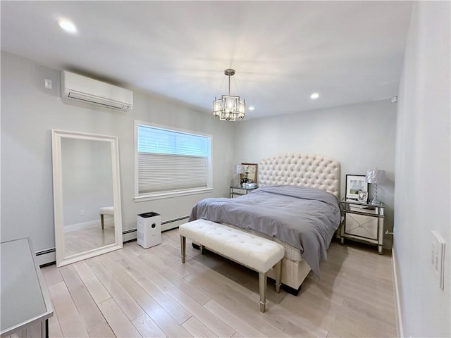 bedroom featuring a baseboard radiator, an AC wall unit, light wood finished floors, and recessed lighting