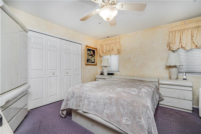 bedroom featuring ceiling fan, carpet floors, and a closet