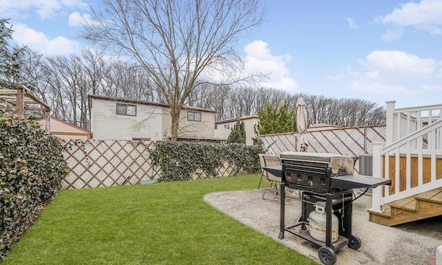 view of yard with a patio and fence