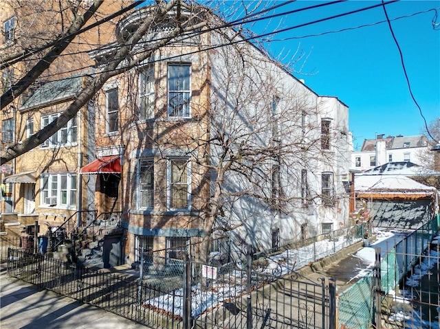 view of front of property with fence