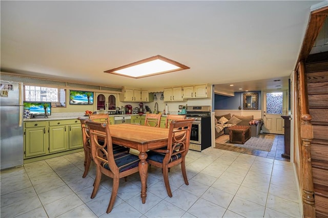 dining room featuring light tile patterned floors