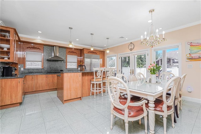90 Giegerich Ave, Staten Island, NY 10307 - dining room featuring a chandelier, recessed lighting, french doors, baseboards, and crown molding