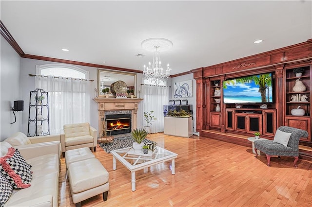 90 Giegerich Ave, Staten Island, NY 10307 - living area with ornamental molding, a chandelier, wood finished floors, a fireplace, and recessed lighting