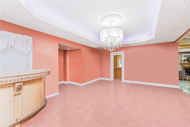 90 Giegerich Ave, Staten Island, NY 10307 - empty room with a tray ceiling, a chandelier, and baseboards