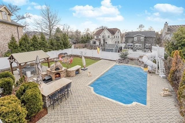 90 Giegerich Ave, Staten Island, NY 10307 - view of pool featuring a patio area, a fenced backyard, a swimming pool, and a residential view