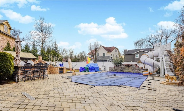 90 Giegerich Ave, Staten Island, NY 10307 - view of swimming pool with a fenced backyard, a patio, and a residential view