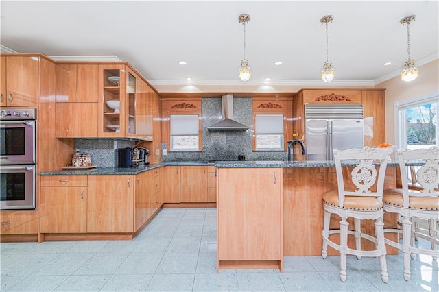 90 Giegerich Ave, Staten Island, NY 10307 - kitchen with wall chimney exhaust hood, appliances with stainless steel finishes, backsplash, glass insert cabinets, and crown molding