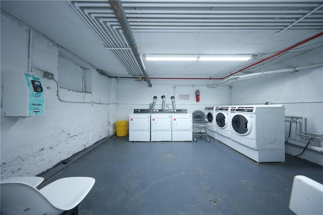 common laundry area with separate washer and dryer