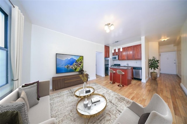 living area featuring light wood-type flooring