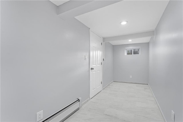 interior space with baseboards and baseboard heating