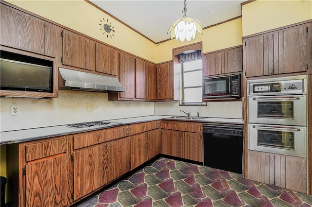 kitchen featuring under cabinet range hood, ornamental molding, brown cabinetry, black appliances, and a sink