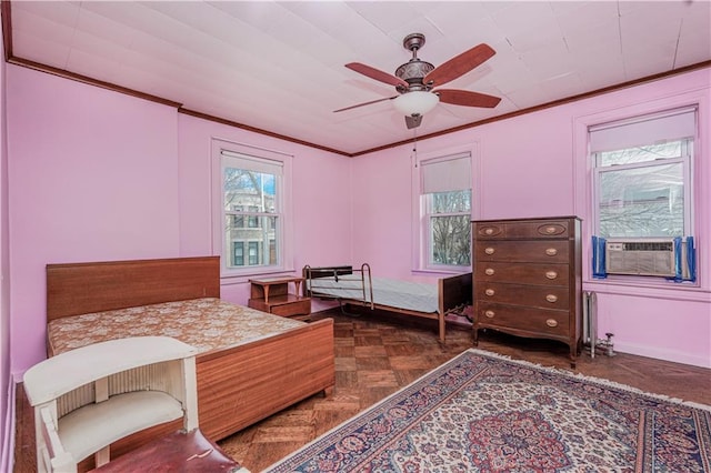 bedroom with cooling unit, ceiling fan, and crown molding