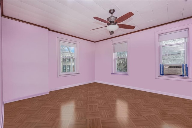 unfurnished room featuring baseboards and ornamental molding