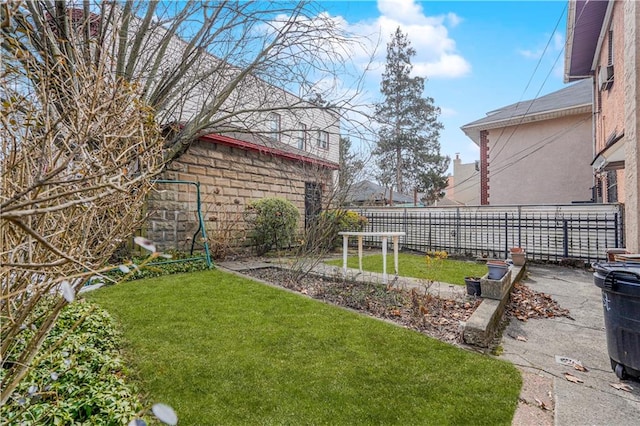 view of yard with fence