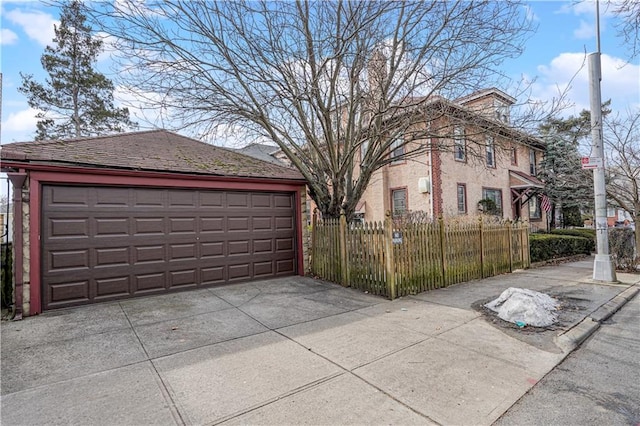 detached garage with fence