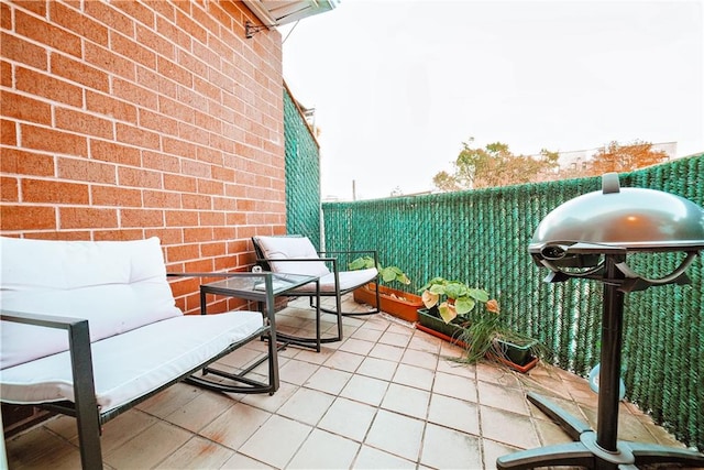 balcony featuring a patio and area for grilling