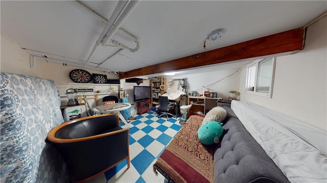 basement featuring tile patterned floors