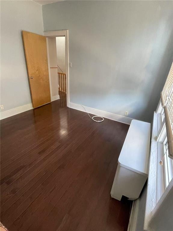 9 Corso Ct, Brooklyn, NY 11223 - unfurnished room featuring wood finished floors and baseboards