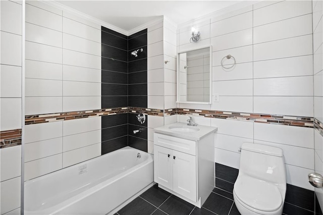 full bathroom with toilet, ornamental molding, tile walls, tile patterned flooring, and vanity