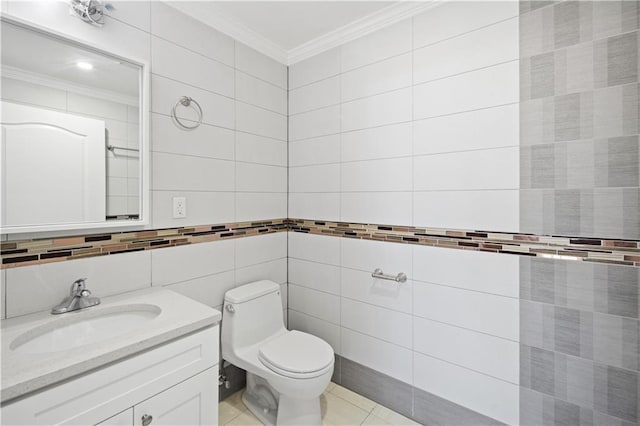 3031 Brighton 5th St Unit 2Fl, Brooklyn, NY 11235 - bathroom featuring ornamental molding, vanity, toilet, tile walls, and tile patterned floors