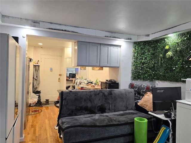 living area featuring light wood finished floors