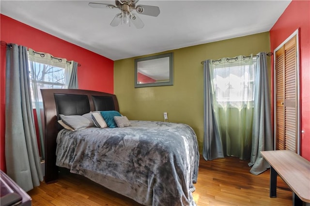 bedroom featuring ceiling fan and wood finished floors