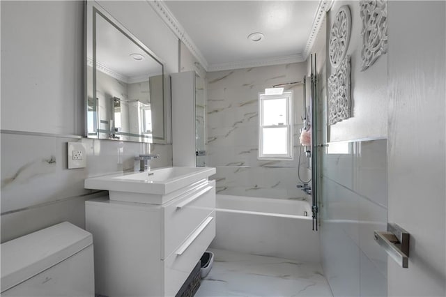 full bath featuring vanity, shower / bath combination, crown molding, toilet, and marble finish floor