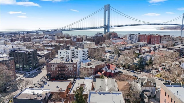 bird's eye view featuring a city view and a water view