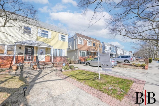multi unit property featuring a residential view
