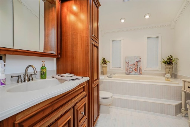 full bath featuring toilet, vanity, and a garden tub