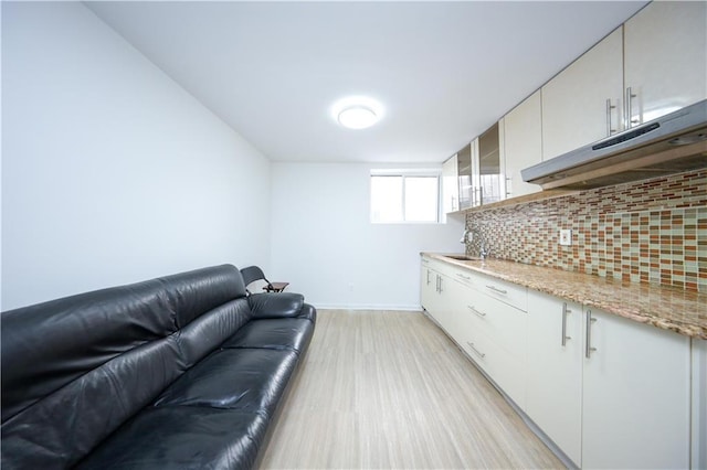 living area with light wood finished floors