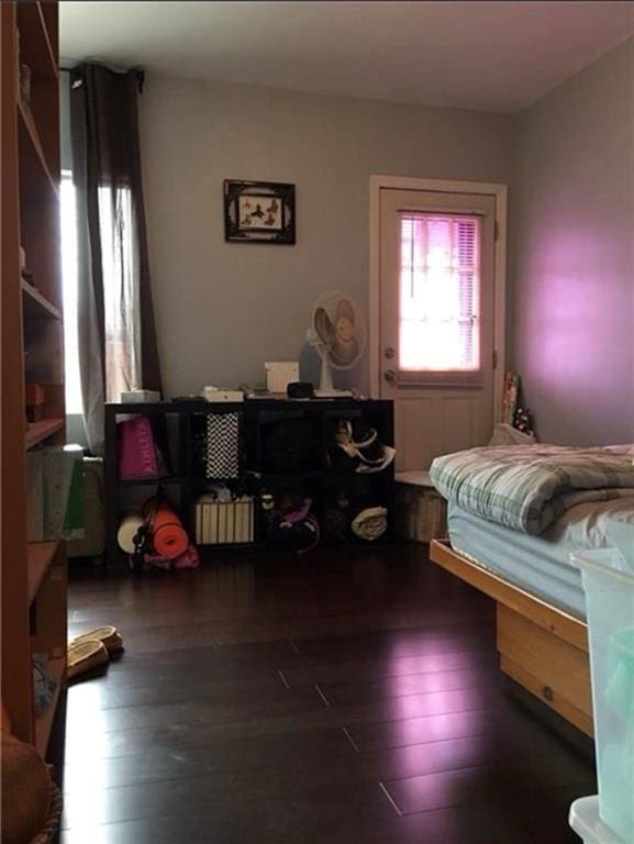 bedroom featuring hardwood / wood-style floors