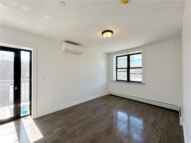 empty room with a baseboard radiator, baseboards, an AC wall unit, and dark wood finished floors