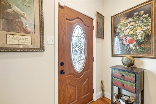 foyer entrance with baseboards