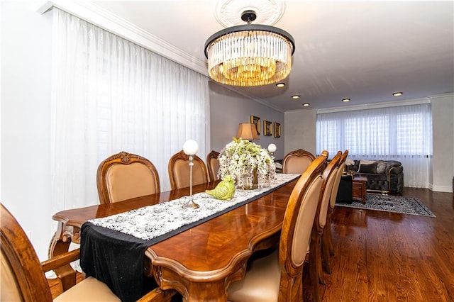 dining room featuring recessed lighting, dark wood-type flooring, a chandelier, and ornamental molding