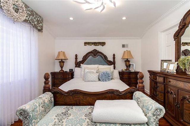 bedroom with recessed lighting, visible vents, and crown molding