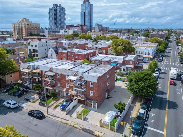 birds eye view of property with a view of city