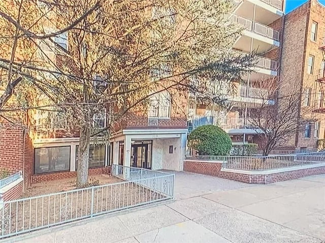 2035 E 7th St Unit 3J, Brooklyn, NY 11223 - view of building exterior with a fenced front yard