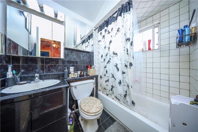 bathroom featuring shower / tub combo, toilet, tile patterned floors, vanity, and backsplash