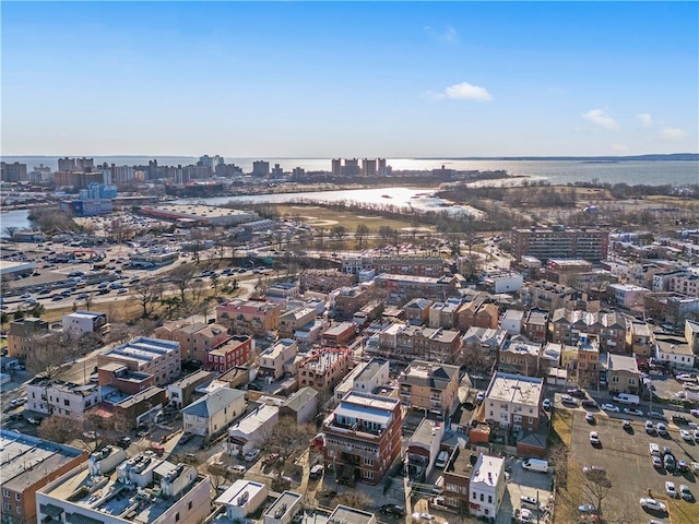 birds eye view of property with a city view