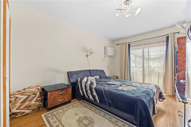 bedroom with wood finished floors