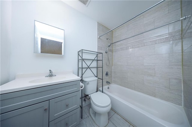 full bathroom featuring visible vents, vanity, toilet, and shower / bathing tub combination