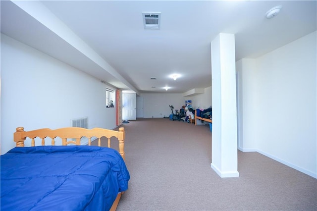 bedroom featuring visible vents, carpet floors, and baseboards