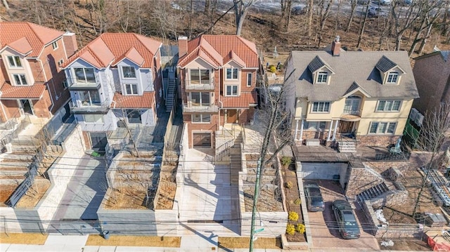 birds eye view of property with a residential view