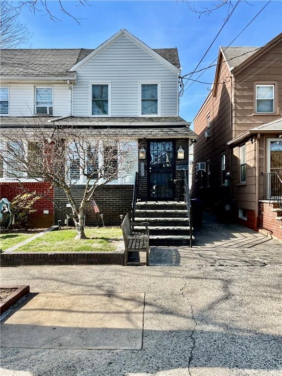 3503 Fillmore Ave, Brooklyn, NY 11234 - view of front facade featuring roof with shingles