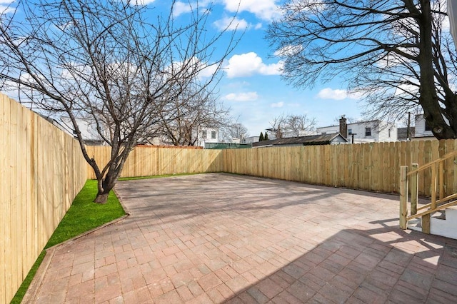 view of patio featuring a fenced backyard