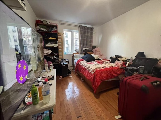 bedroom featuring light wood-type flooring